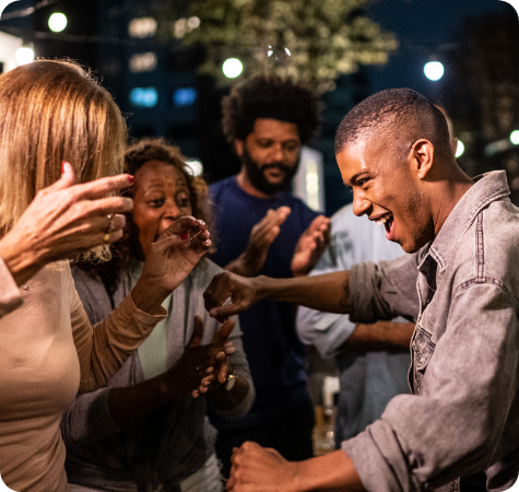 Group of friends dancing at a party