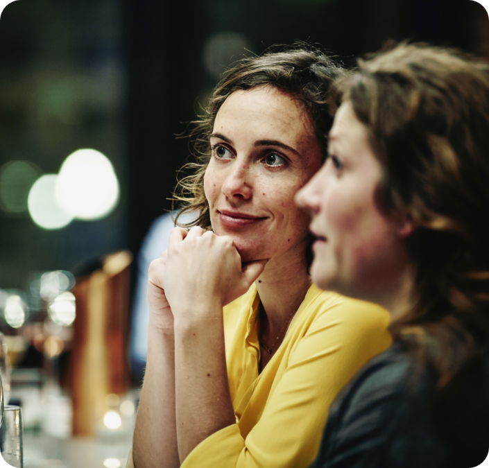Two woman at a brunch gathering